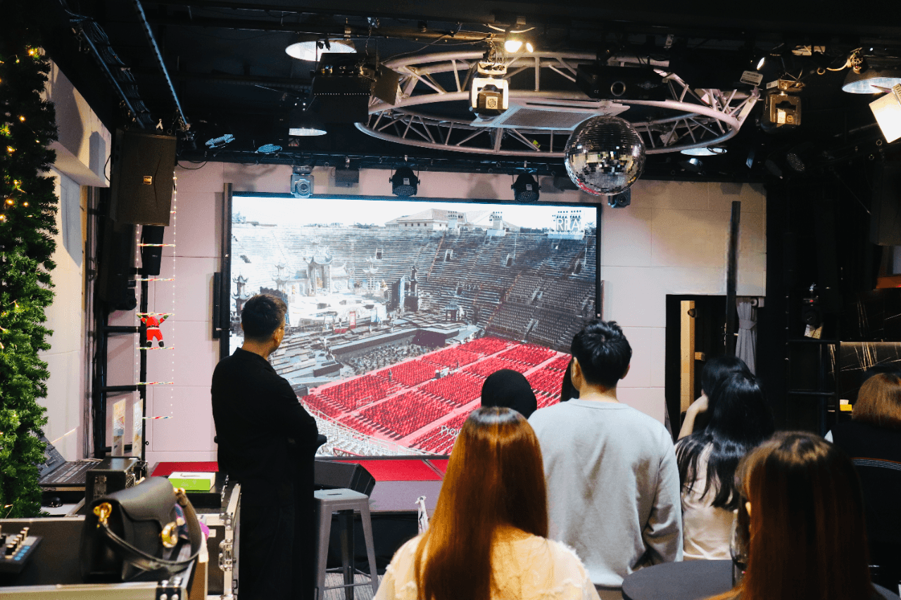 Consultation session reviewing architectural sound plans